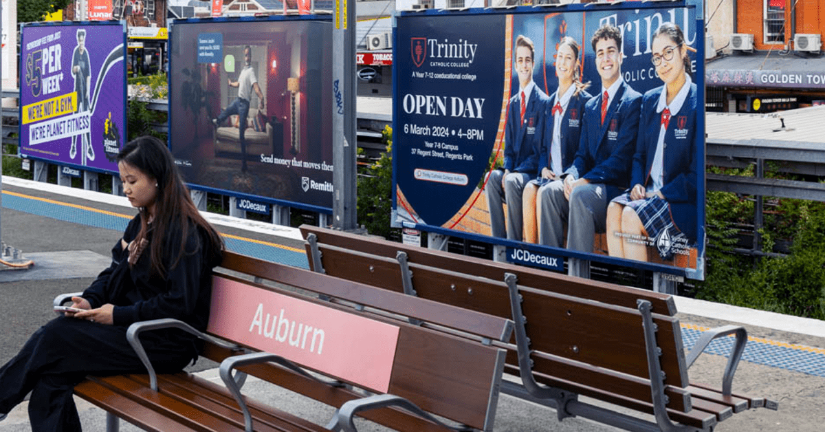 Train station with train station ads.