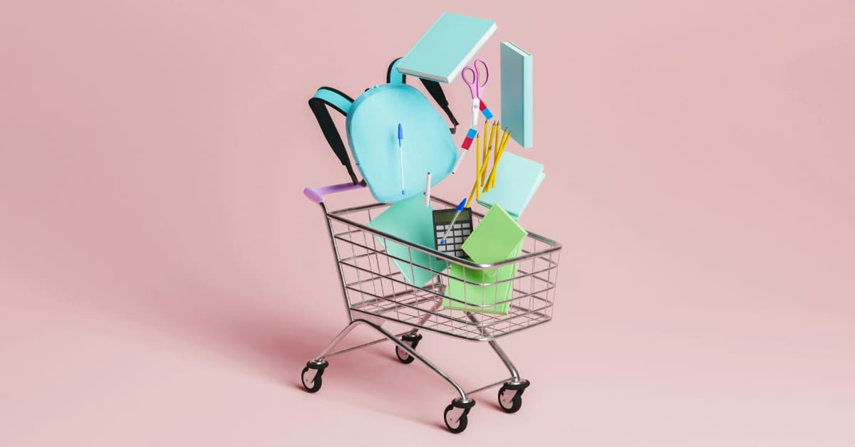 Shopping cart loaded with various items.